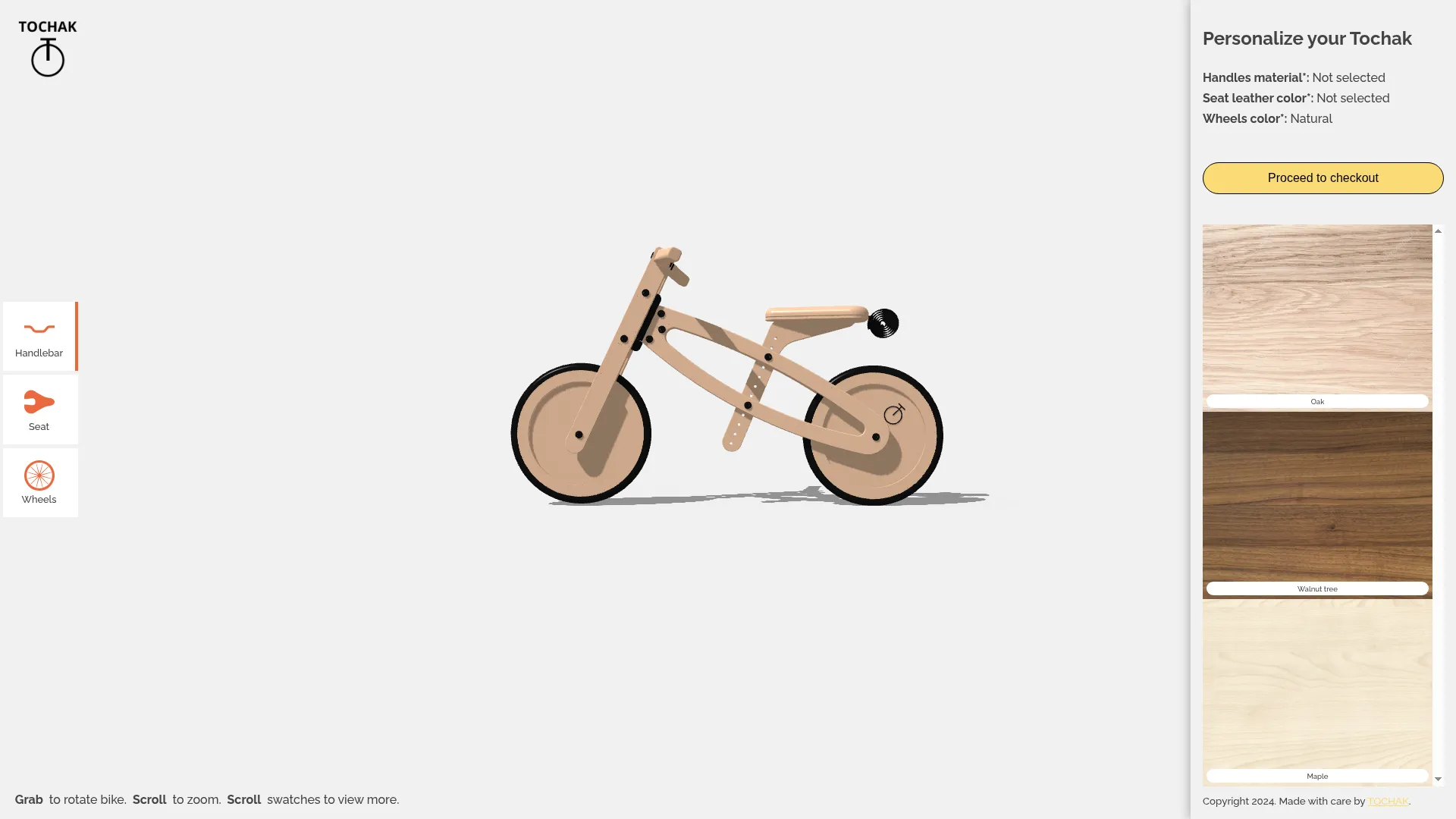 The configurator in the browser, the bike in bare wood, handlebar tray open.